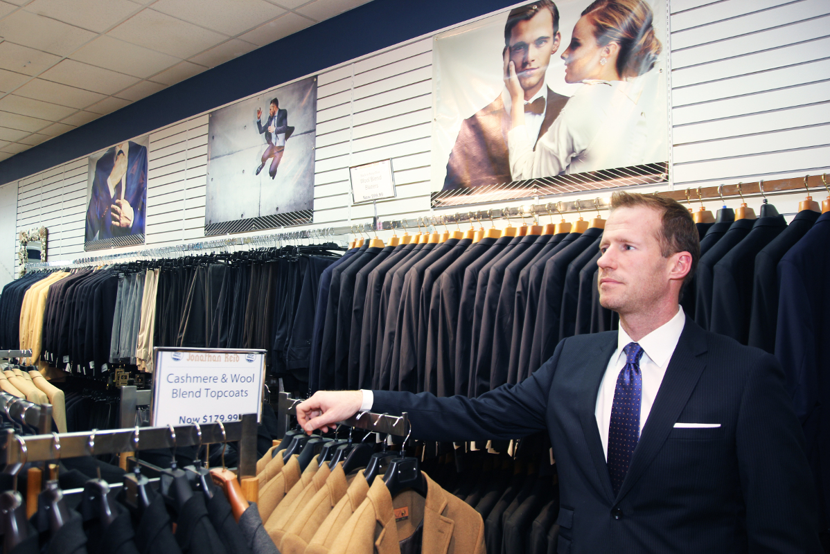 Owner Jeffrey Ives standing in the Jonathan Reid store